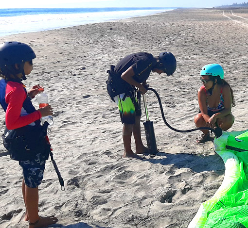 children having fun learning kitesurf with oaxakite